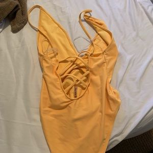 Sexy yellow low v neck one piece